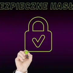 Ręka rysuje zieloną kłódkę z zaznaczeniem, symbolizującą bezpieczne hasło. Tekst nad nią brzmi "BEZPIECZNE HASŁO".